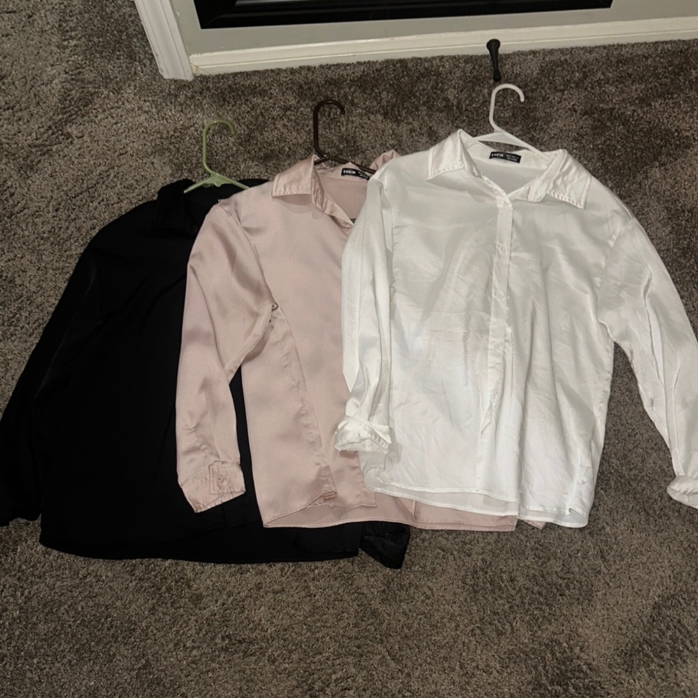 Black, Pink, and White Button-Up Blouses